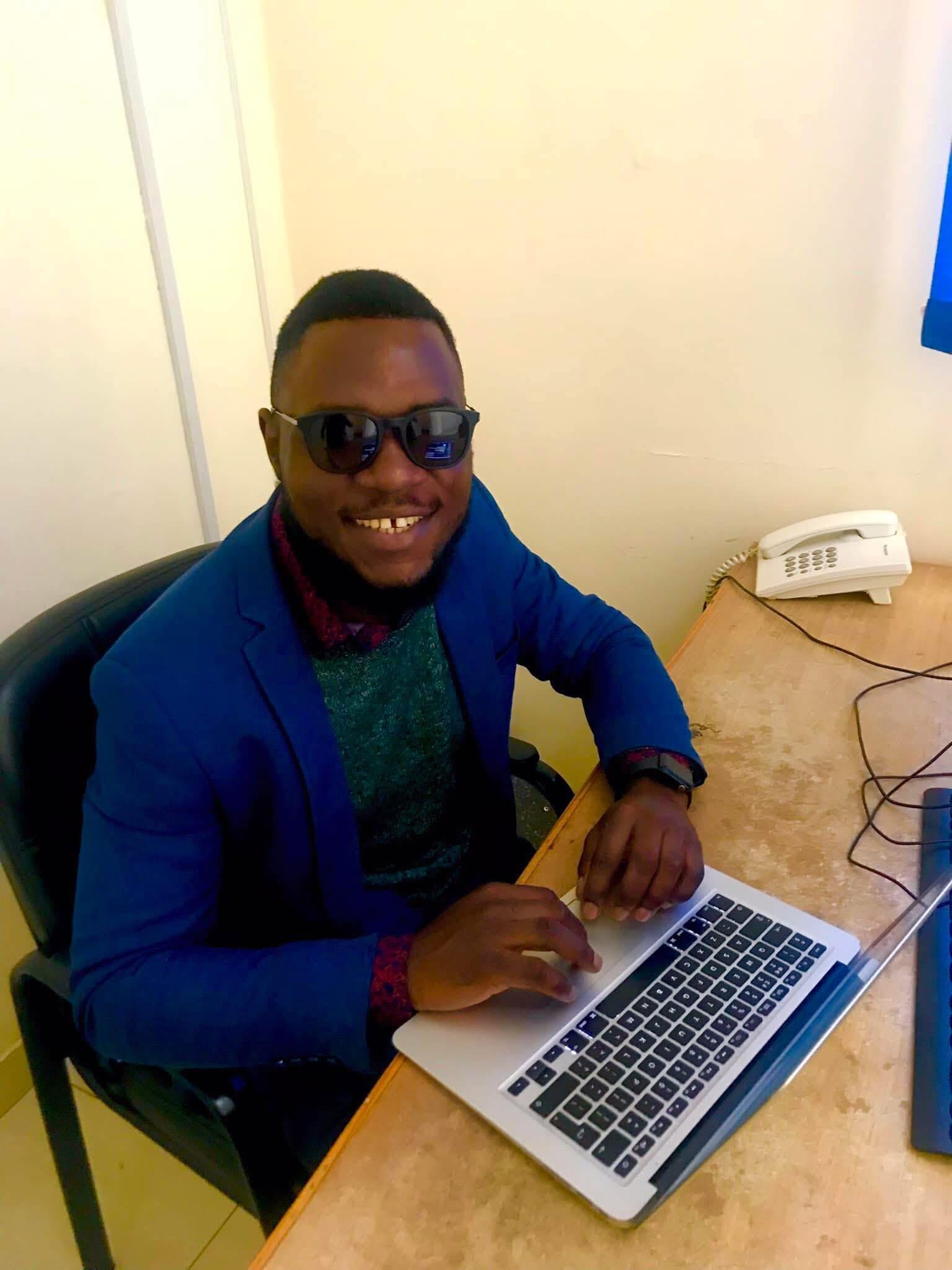 Raoultix Director working at his desk